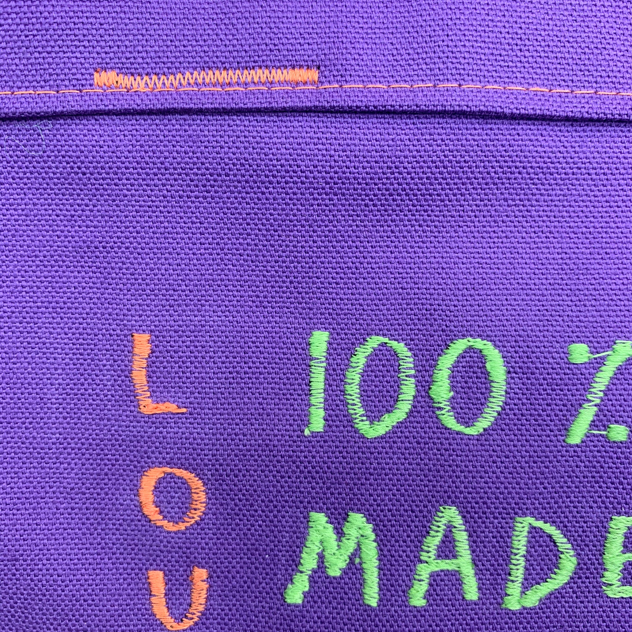 Freehand machine embroidered handmade bag
