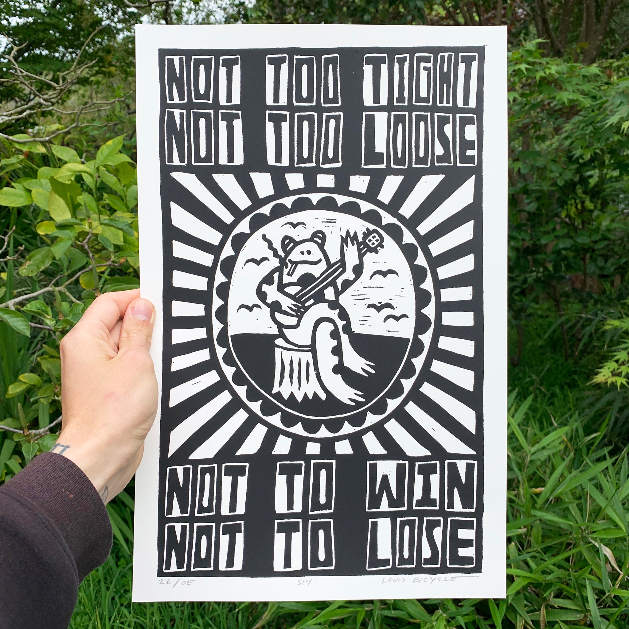 Screen printed poster by artist Louis Bicycle. Frog playing banjo. Text "Not too tight, not too loose, not to win, not to lose."